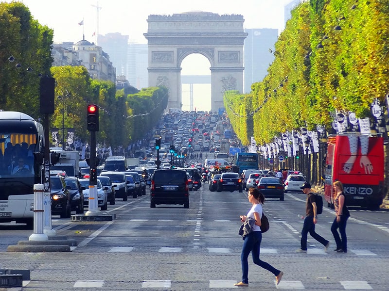 women crossing Champs-Élysées