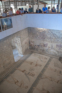 people looking at mosaics - cities in Sicily