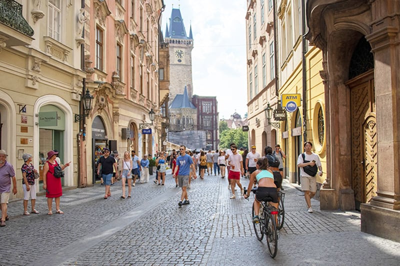 Bicycling through Old Town Prague, one of the most popular places for a walking tour of the city