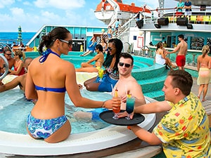 people having drinks at a pool on a mini-cruise