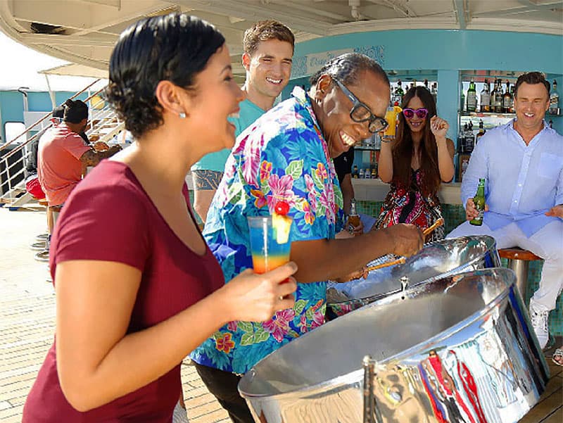 people by the bar on a mini-cruise