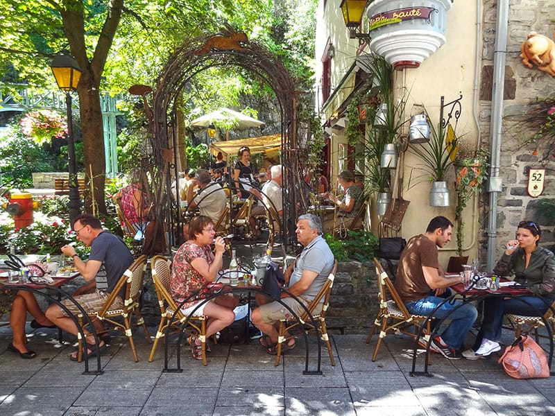 people in an outdoor restaurant seen on a tour of Quebec City