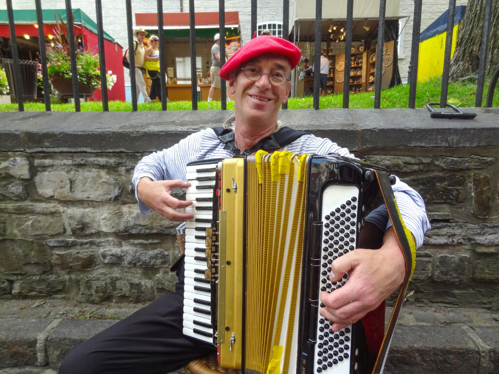 a street musician playing an accordion