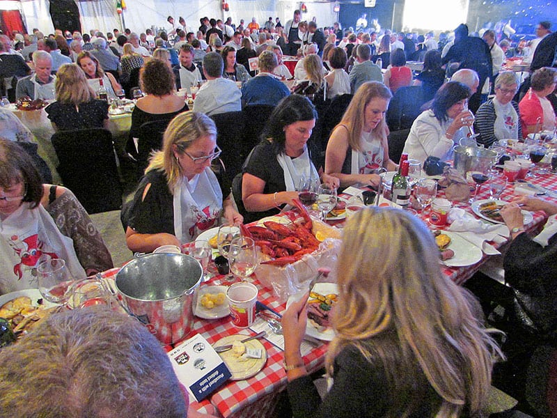 people dining on mussels and lobster