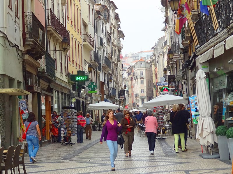 people on in the old city of Coimbra seen on a day trip from Lisbon