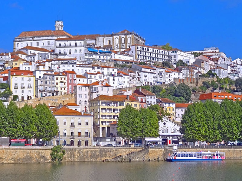 image of Coimbra, Portugal from across a ribver