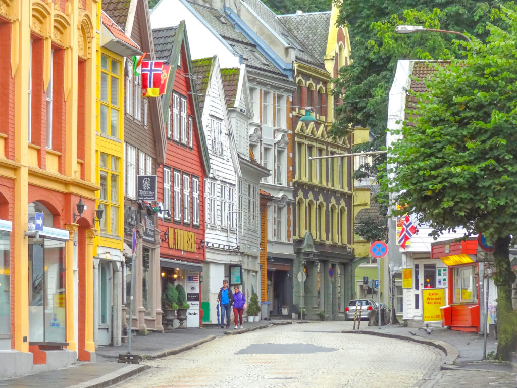 a street with colorful buildings - things to do in Bergen Norway