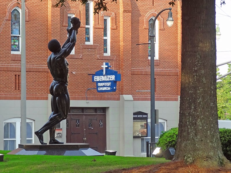 a statue outside a church, one of the things to see in atlanta with kids