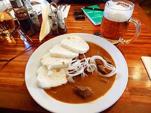 a bowl of dumplings in one of the best restaurants in Prague