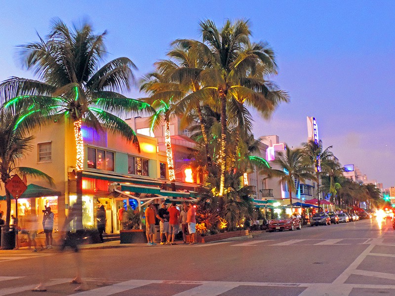 people on the street in South beach - where to stay in Miami