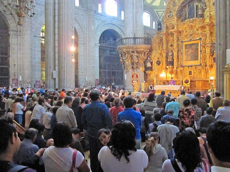 people in the cathedral in the Zocalo, Mexico City