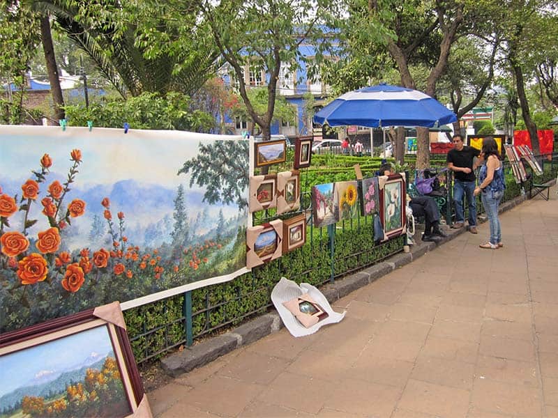 people in an art fair in a park in San Angel, Mexico City