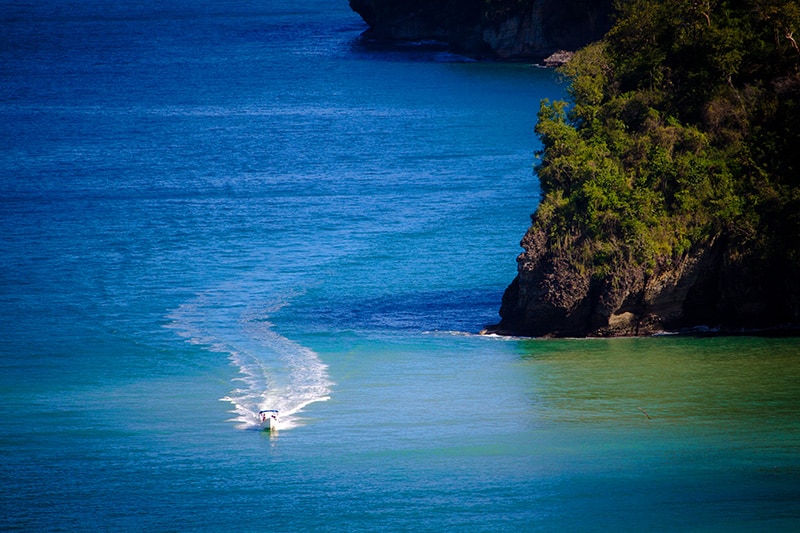 a speeding boat returning to it St. Lucia accommodation