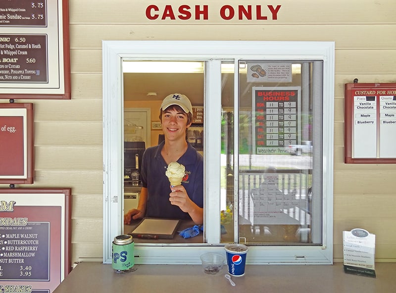 a boy with an ice cream cone at a custard stand on Maine's Route 1