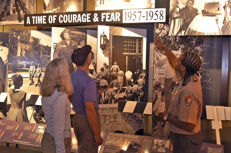 visitors looking at an exhibit at Central High School, one of the things to do in Little Rock