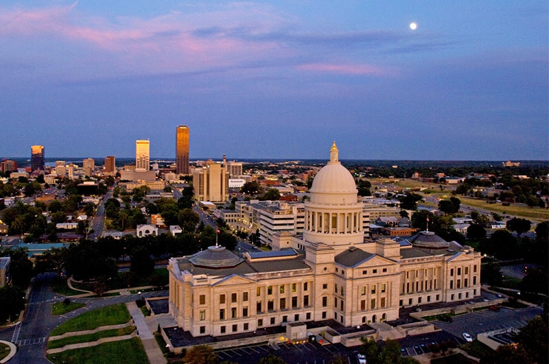 a state capitol building at dusk