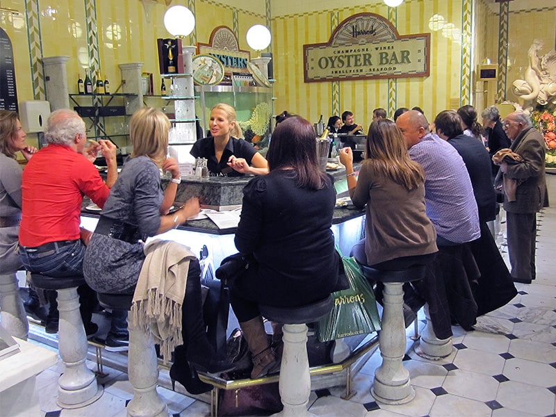 people on a London Walk visiting teh Oyster Bar in Harrods