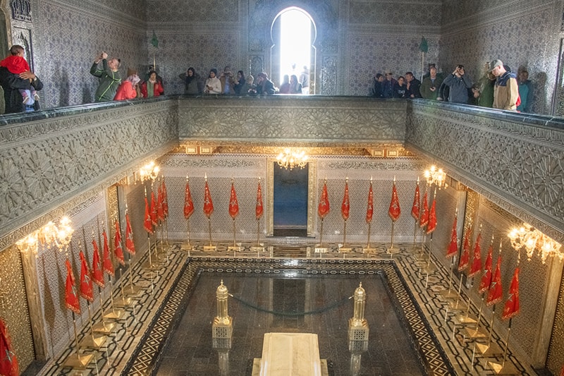 Visitors in the King's mausoleum, one of the places to visit in Morocco