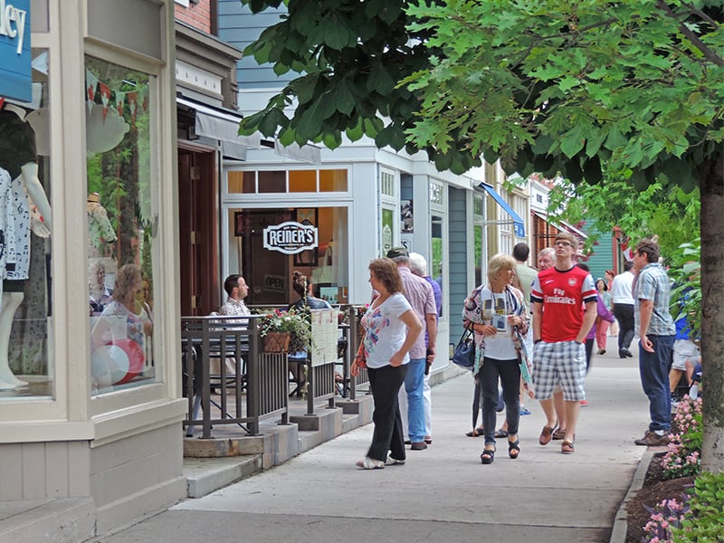 people strolling along Queen Street