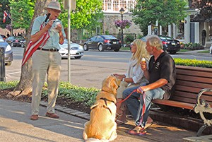 people on a bench in Niagara on the lake