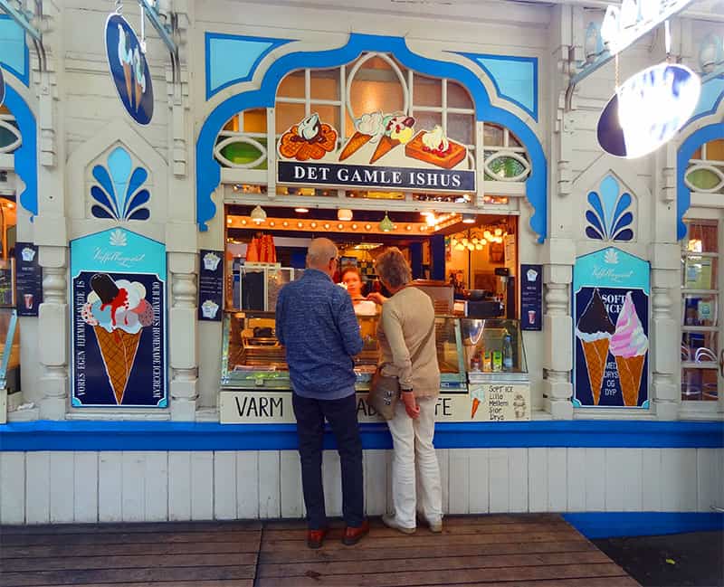 people in Tivoli Gardens bying ice cream