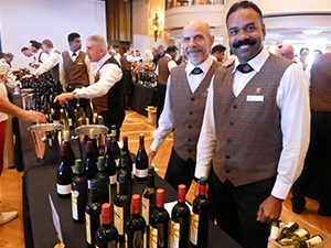 people at a tasting on a wine cruise