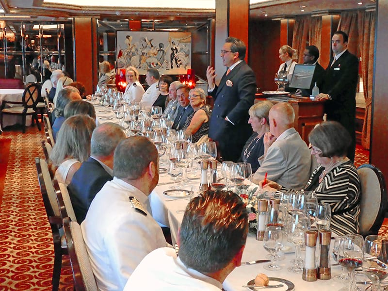 man giving a speech at dinner