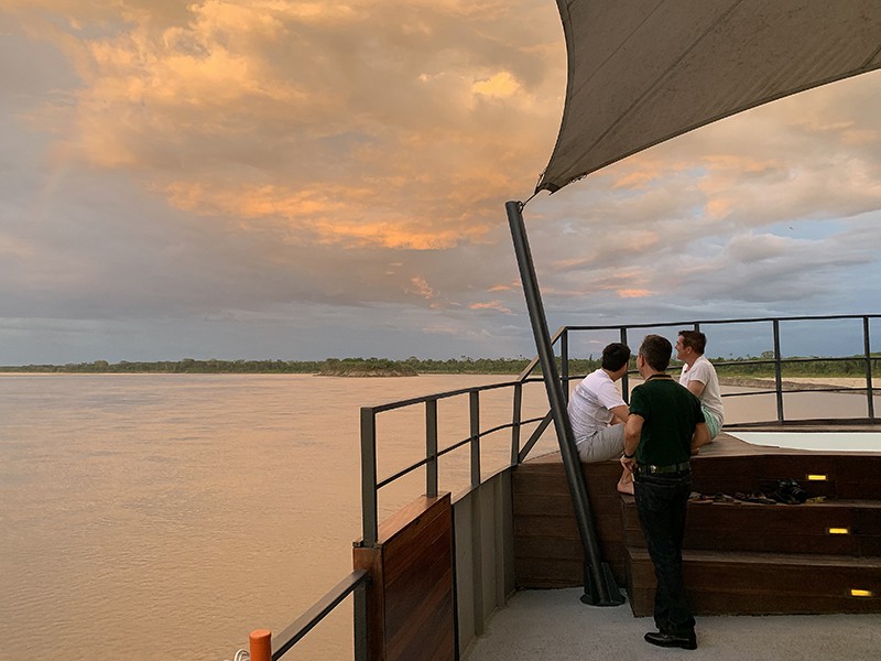 sunset on our luxury Amazon River cruise in Peru