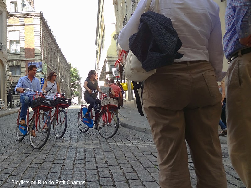 people on bicycles in photos of Paris