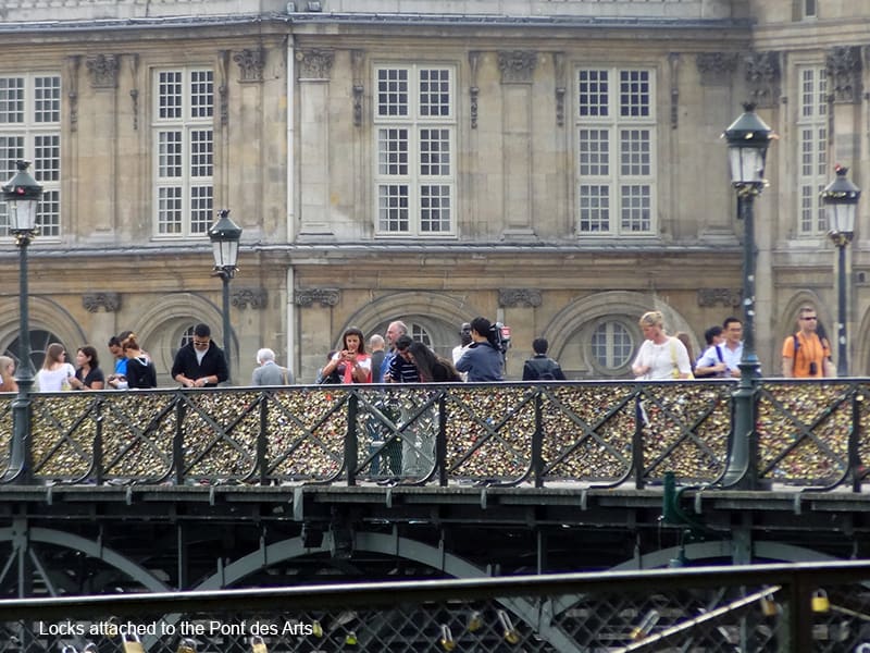 people on a bridge in photos of Paris