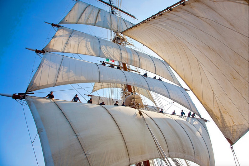 sailors on the sails on a Sea Cloud cruise