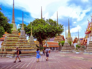 people admiring stupas, one of the things to see on a 4-day Itinerary in Bangkok