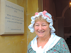 a housekeeper with a shite hat seen on day trips from London 