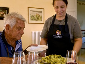 a man having lunch at wineries in sicily