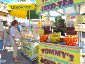 people at a street fair on a Florida Gulf Coast road trip