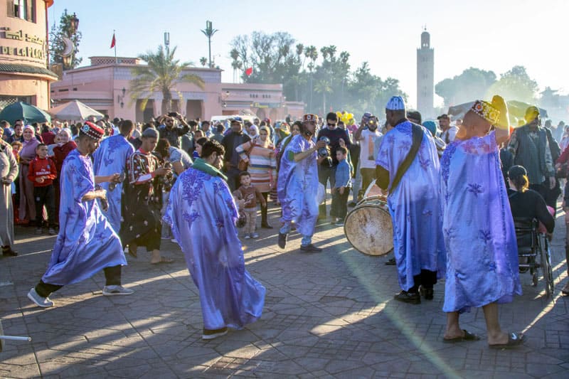 watching performers in the Jemma-el-Fna, one of the things to do in Marrakesh