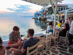 people having drinks in a cafe