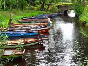 boats in a stream on Ireland's West Coast
