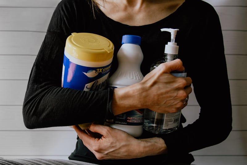 woman holding supplies for a best road trip