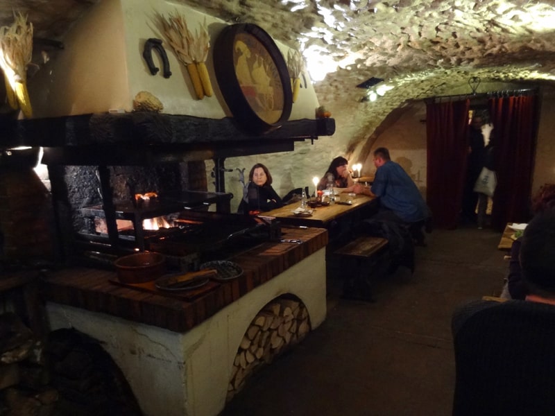 people in an old restaurant in Cesky Krumlov 