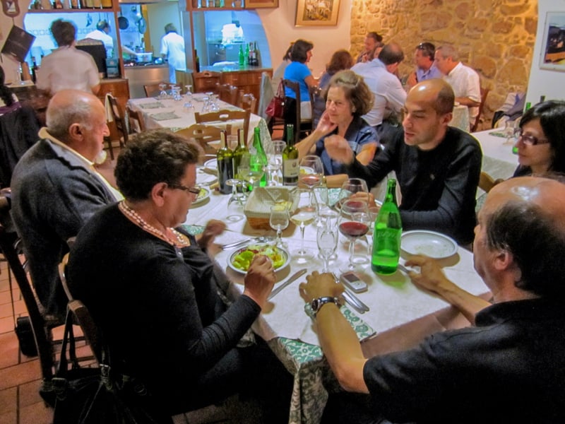 people at a large table in a restaurant