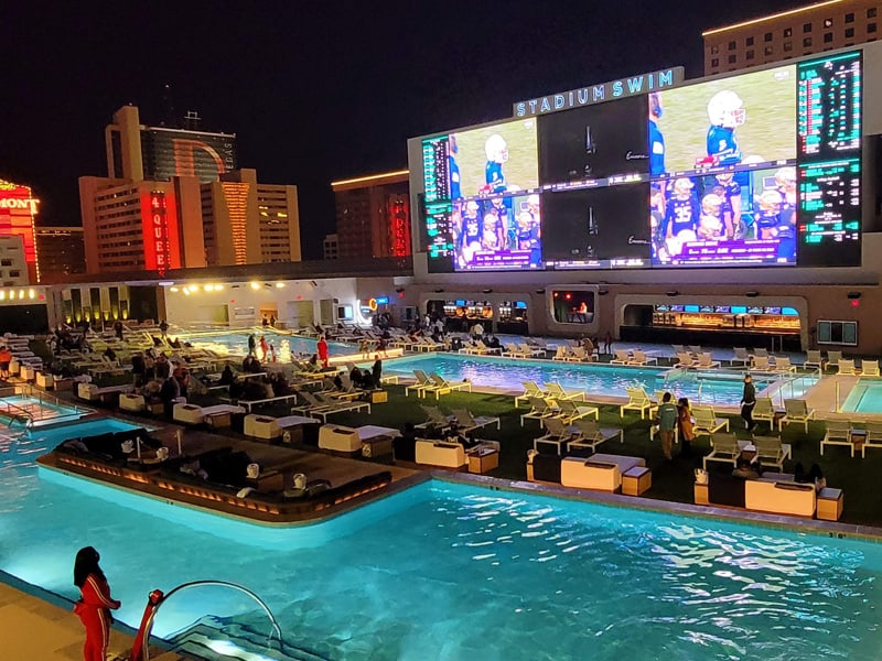 A large swimming pool complex- enjoying pools are one of the popular Things to Do in Las Vegas Besides Gambling 