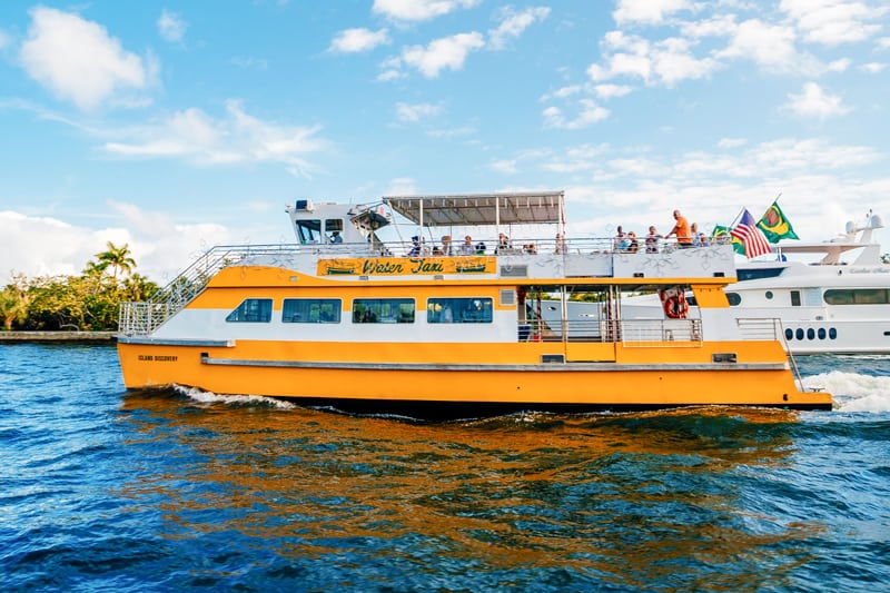 people riding on the Water Taxi, one of the fun things to do in Fort Lauderdale