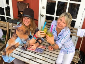 Two women having drinks at a cafe