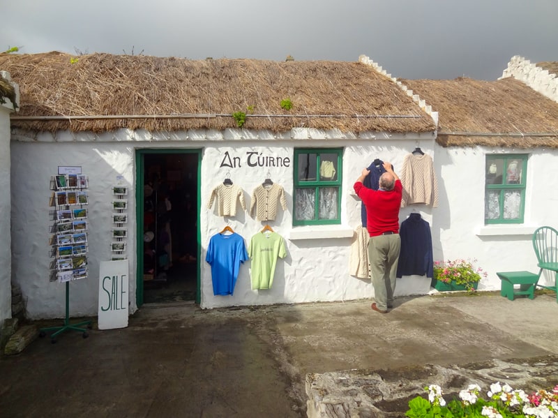 A man in a red sweater at a shop on the Aran Islands Ireland