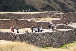 people inside the remains of an old fortress seen in Cusco and the Sacred Valley in Peru