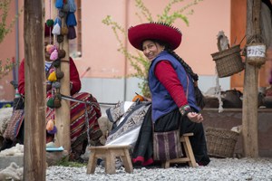 a woman in a large hat seen in Cusco and the Sacred Valley in Peru