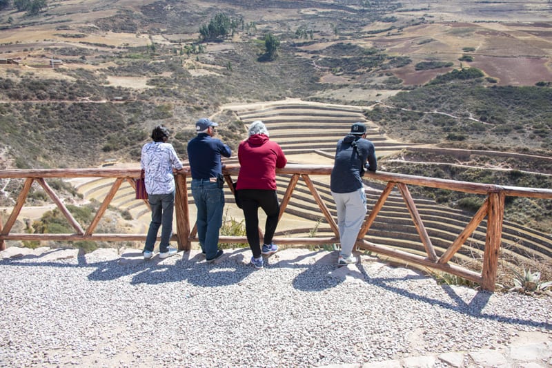 people looking at large terraces seen in Cusco and the Sacred Valley in Peru