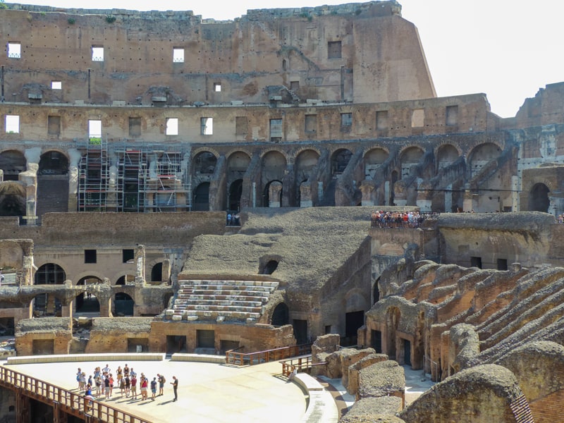 people in the ruins of the Colosseum, seen on walks in Rome