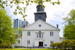 and old white church in a park